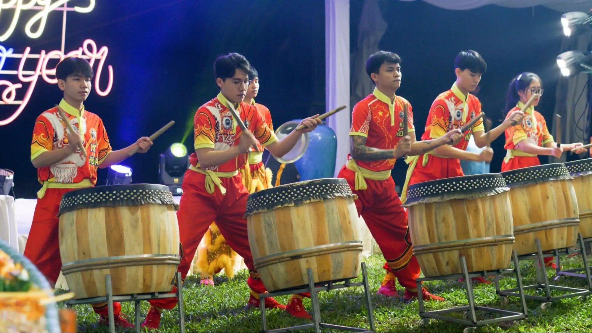 The program opens with a traditional drum performance