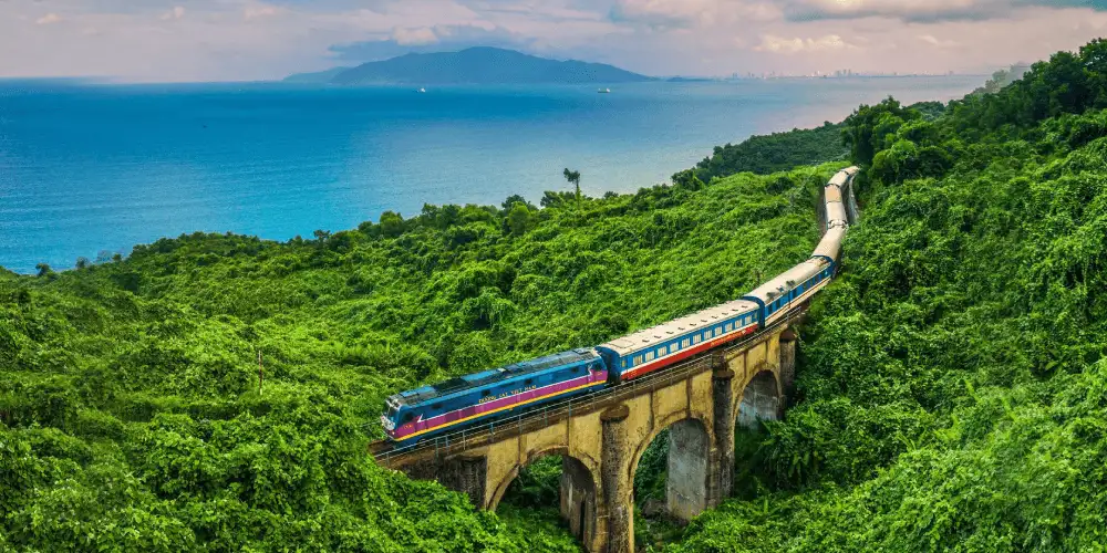 Travelers can enjoy scenic landscapes of Vietnam while traveling by train (source: Ivivu)