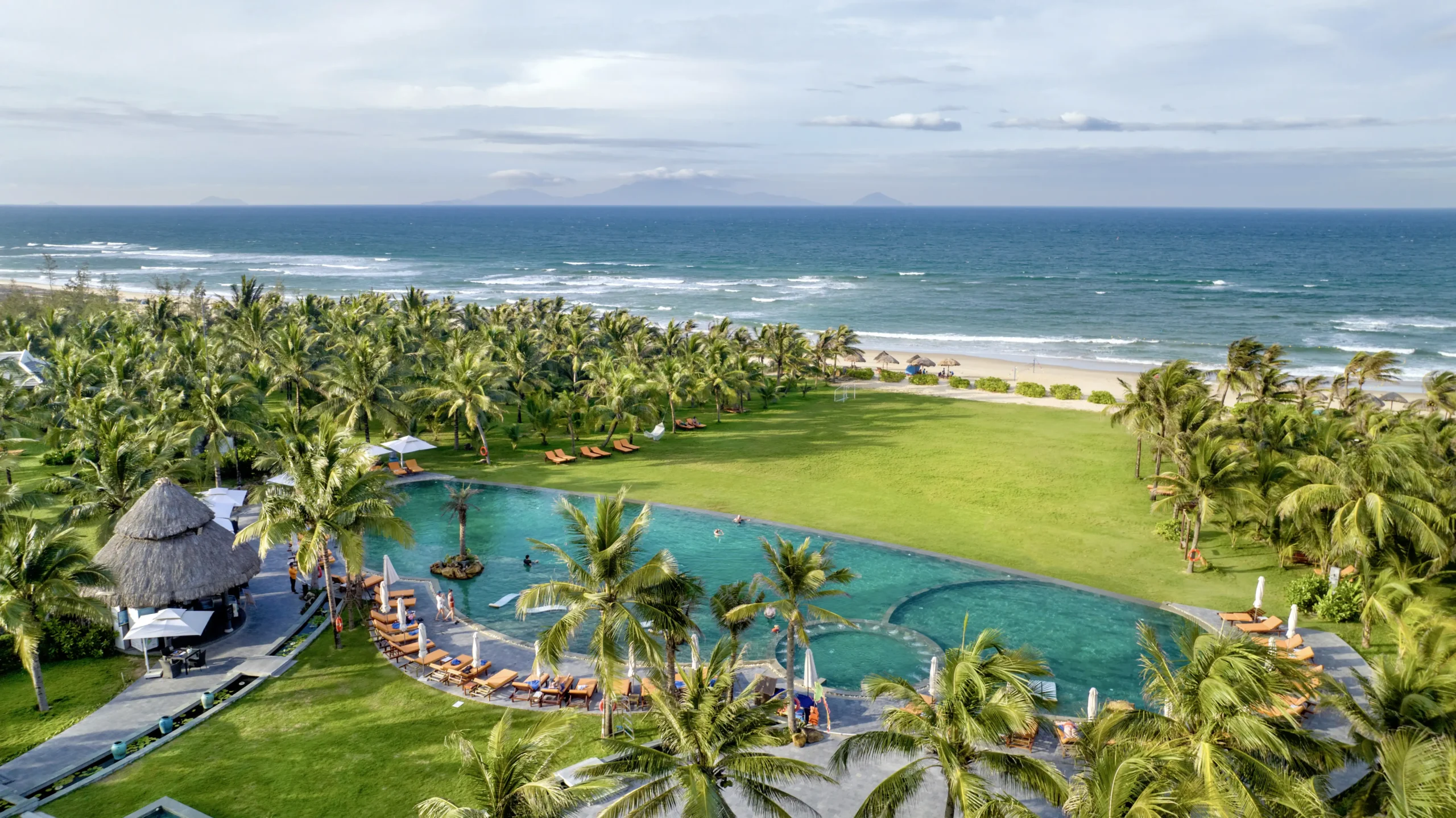 Bliss Hoi An offers a quieter beach base near Binh Minh Beach, away from the busiest streets of Hoi An Ancient Town.