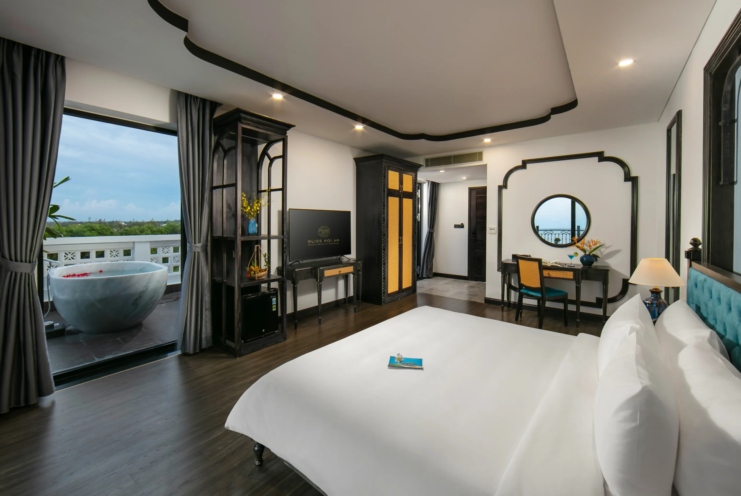 Rooms and villas at Bliss Hoi An are designed for couples, families and longer beachfront stays