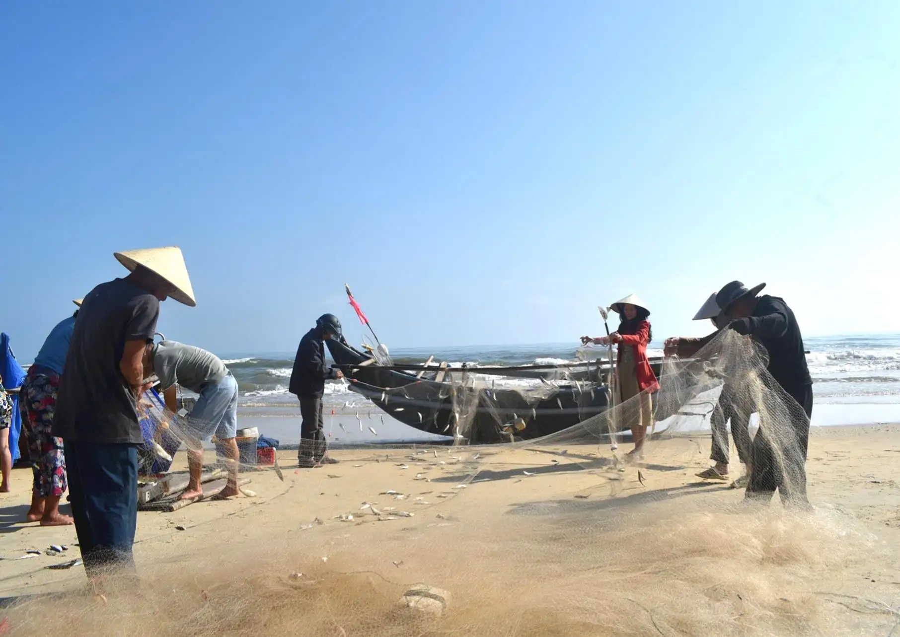Murals in Tam Thanh often reflect fishing life and coastal culture