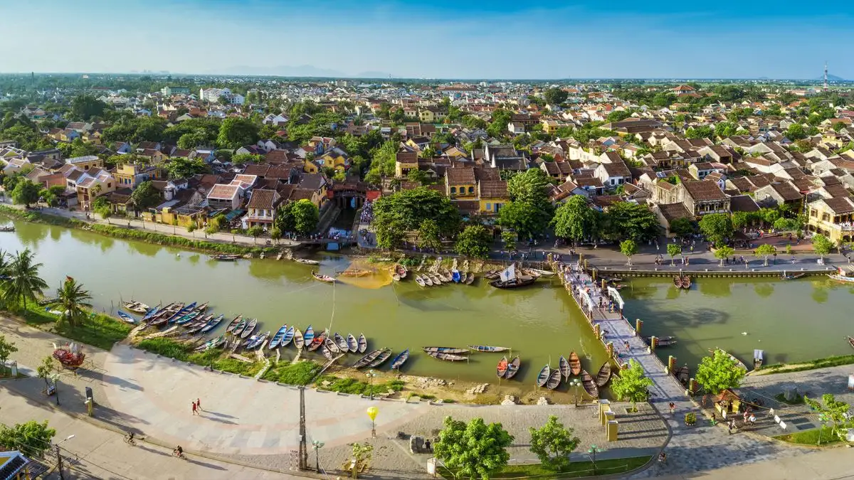 Aerial view of Hoi An Old Town showing its organized grid of rooftops and intersecting narrow streets (Source: Da Nang Fantasticity)