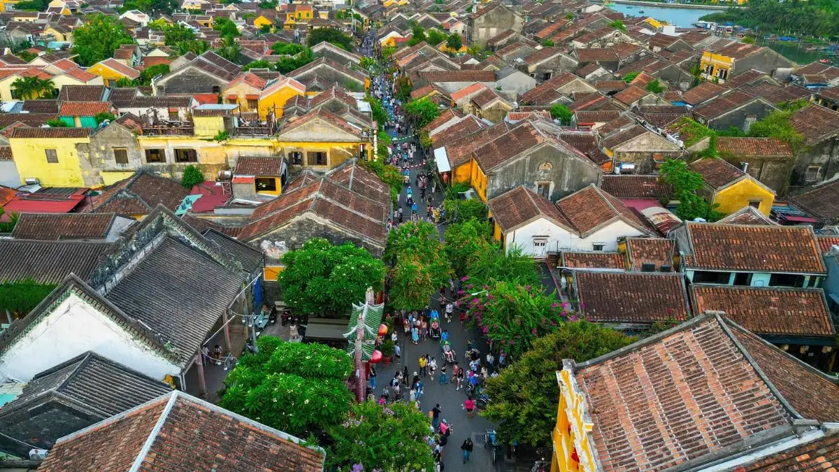 Aerial view of Hoi An Old Town with traditional rooftops and narrow streets arranged in a historic grid pattern (Source: Da Nang News)