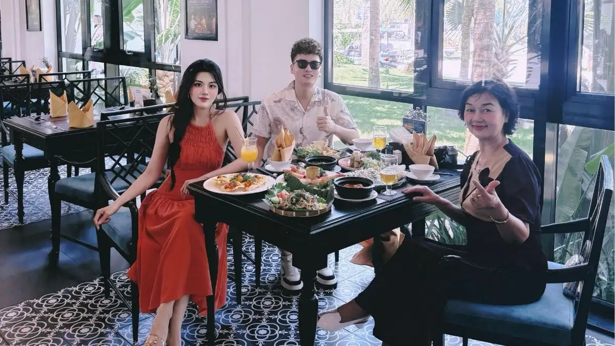 Refined resort attire for a relaxed dinner at Binh Minh Restaurant, Bliss Hoi An