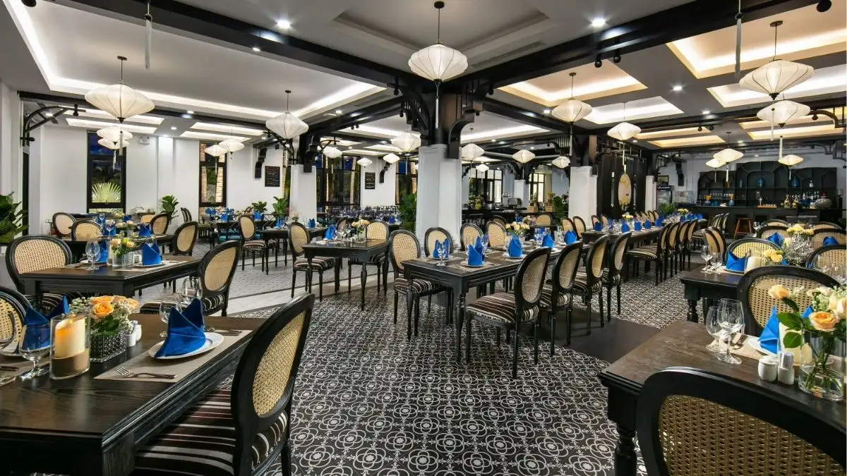 At Bliss Hoi An, the beachfront Binh Minh Restaurant seats 120 guests indoors and 50 outdoors