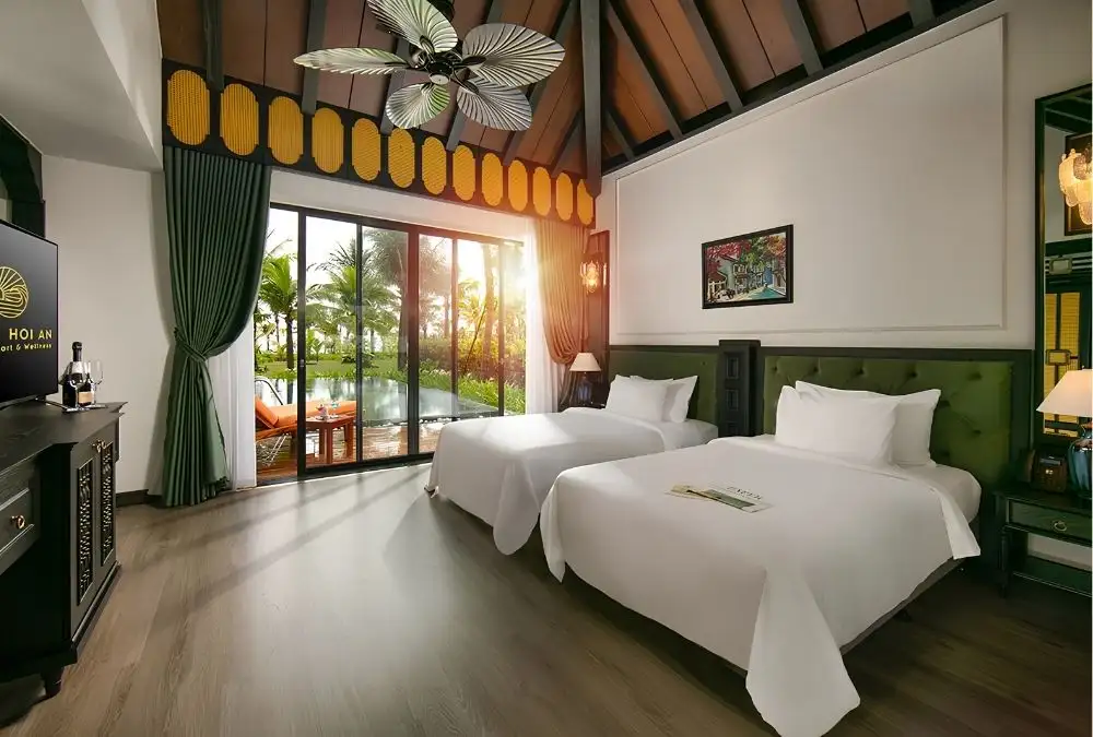 A bright, comfortable guest room at Bliss Hoi An, designed for a relaxing beach stay