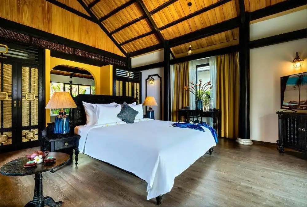 Indochine interiors can look alike when they rely on familiar details such as rattan chairs, patterned tiles and lanterns