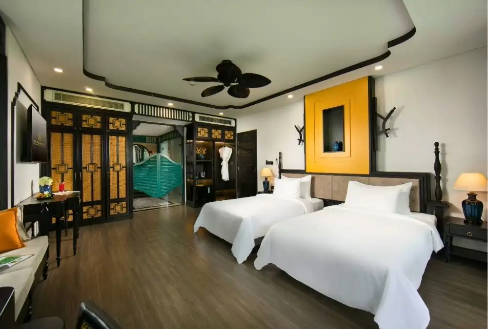 At Bliss Hoi An, the Indochine room reflects Hoi An’s nostalgic charm through its distinctive design