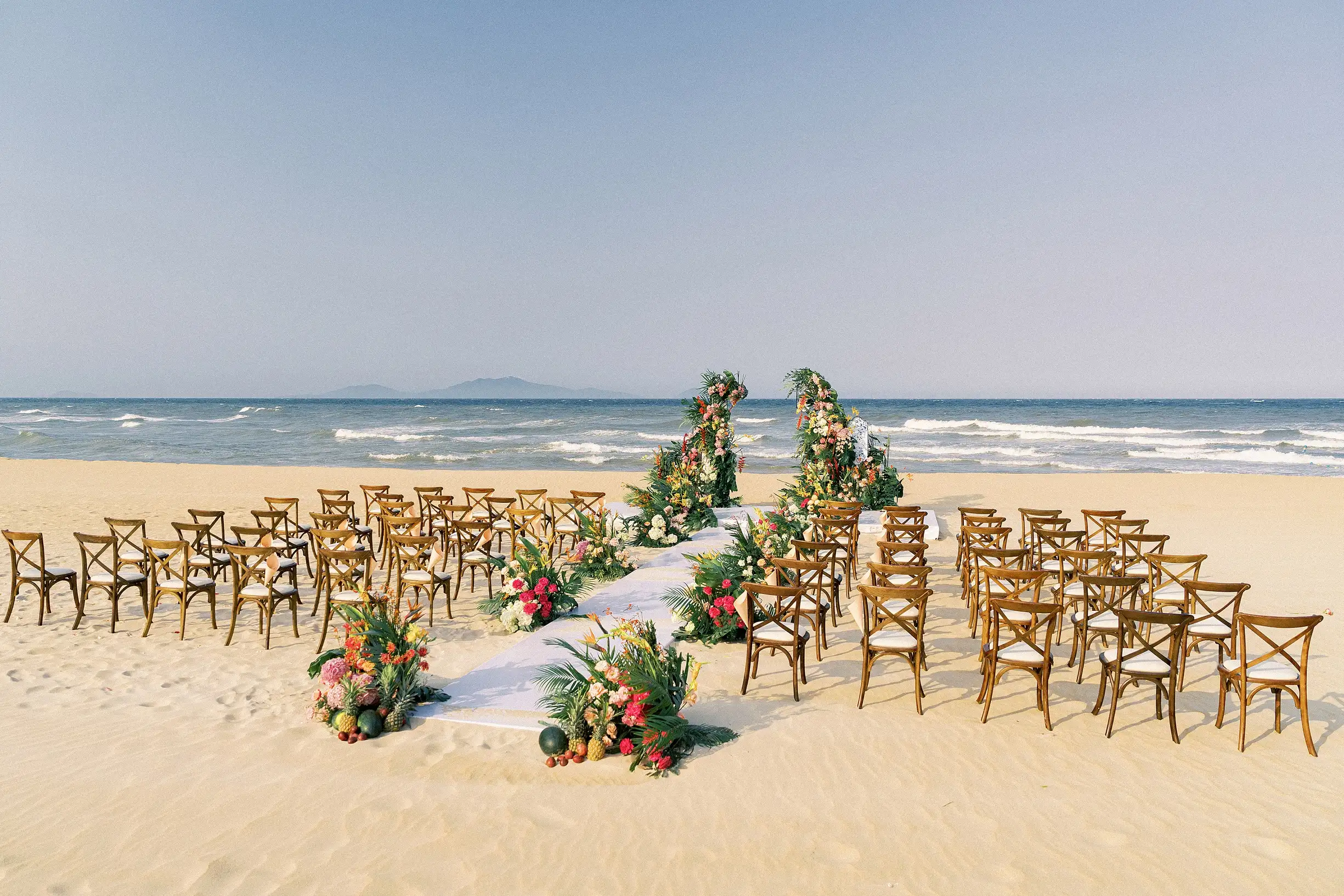 Hold the main ceremony by the beach, with the sea providing the natural backdrop