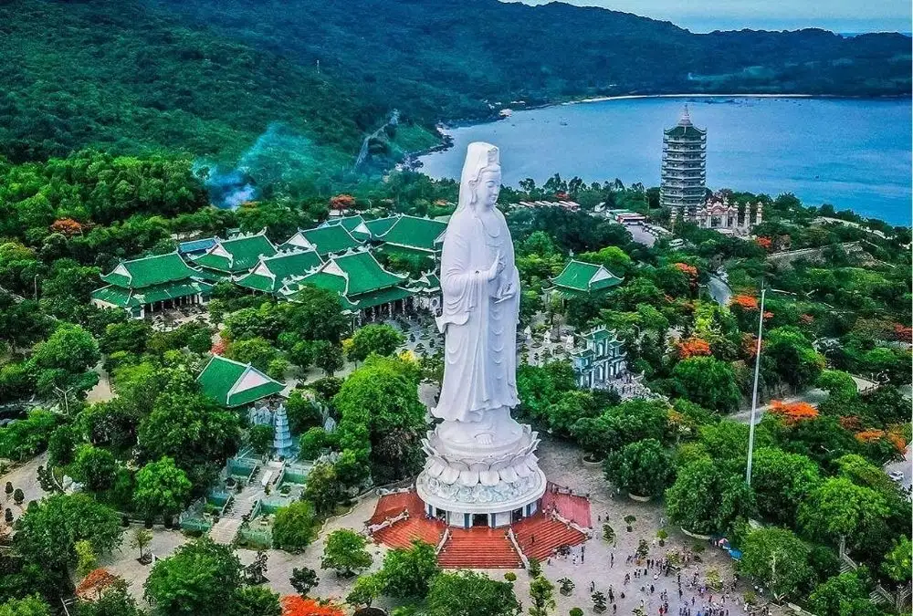 The Lady Buddha statue at Linh Ung Pagoda overlooks Da Nang Bay from the forested slopes of Son Tra Peninsula (Source: Google Art&Culture)