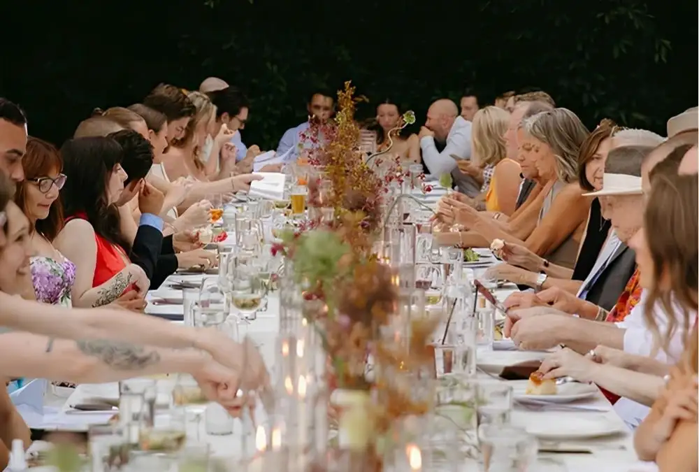 Arrange the tables in a "dinner party" style to foster connection (Source: Cambria Shelley Photography)