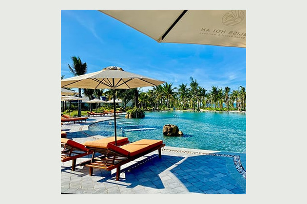 Infinity pool Bliss Hoi An beach resort wellness